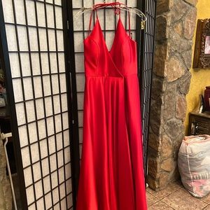 Long red dress with a slit